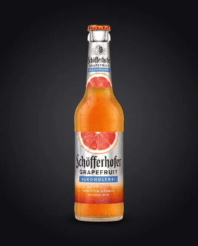Flasche Schöfferhofer Grapefruit alkoholfrei mit orangem Etikett und Grapefruit-Motiv